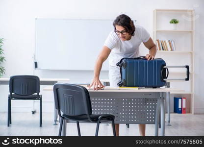 The young male student in front of whiteboard. Young male student in front of whiteboard