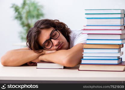 The young male student sitting in the classroom. Young male student sitting in the classroom