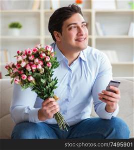 The young man chatting with his sweetheart over mobile phone. Young man chatting with his sweetheart over mobile phone
