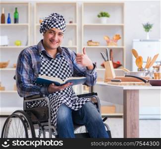 The young man cook with book of food recipes. Young man cook with book of food recipes
