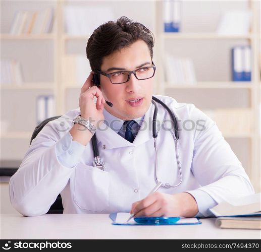 The young man doctor in medical concept. Young man doctor in medical concept
