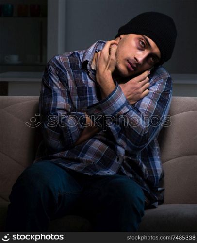 The young man in agony having problems with narcotics. Young man in agony having problems with narcotics