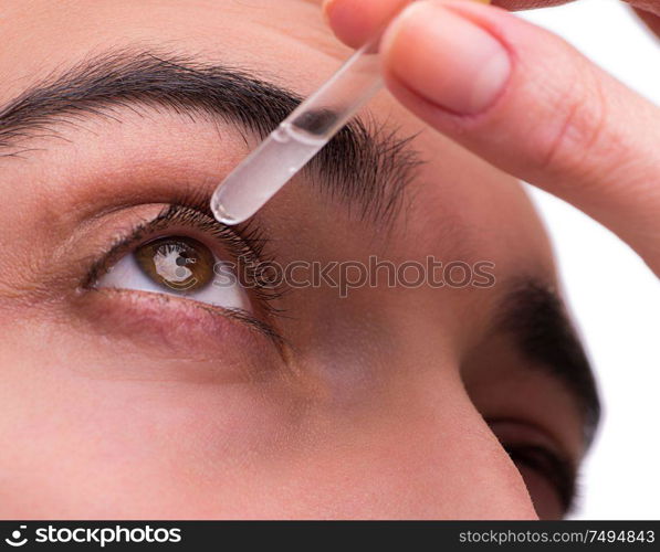 The young man in eye care medical concept. Young man in eye care medical concept