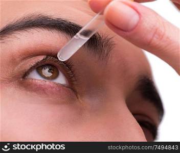 The young man in eye care medical concept. Young man in eye care medical concept