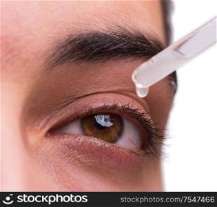 The young man in eye care medical concept. Young man in eye care medical concept