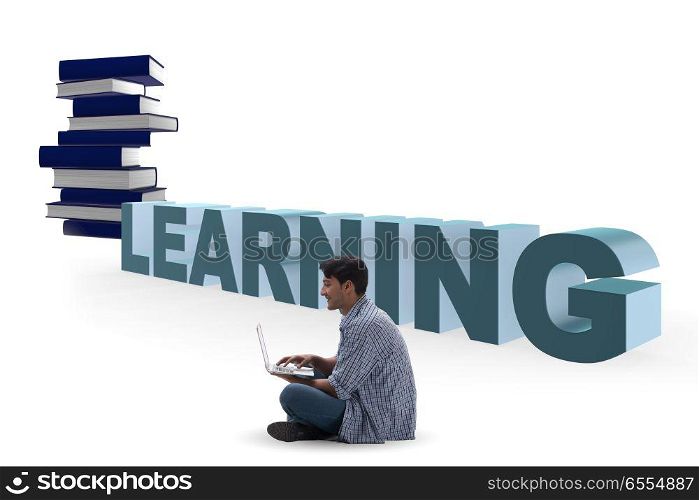 The young man in telelearning concept with laptop and books. Young man in telelearning concept with laptop and books. The young man in telelearning concept with laptop and books