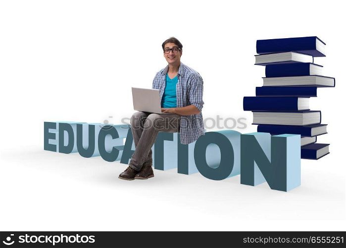 The young man in telelearning concept with laptop and books. Young man in telelearning concept with laptop and books. The young man in telelearning concept with laptop and books