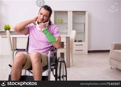 The young man suffering at home after car accident. Young man suffering at home after car accident