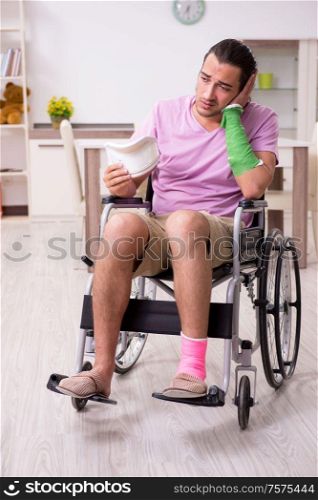 The young man suffering at home after car accident. Young man suffering at home after car accident