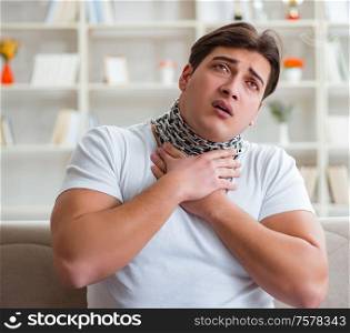 The young man suffering from sore throat. Young man suffering from sore throat