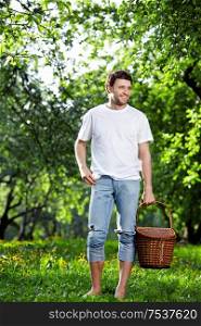 The young man with a basket in forest