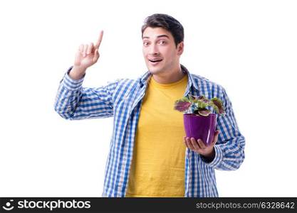 The young man with flower pot isolated on white. Young man with flower pot isolated on white