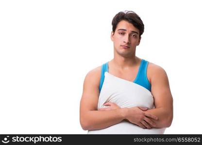 The young man with pillow isolated on white background. Young man with pillow isolated on white background