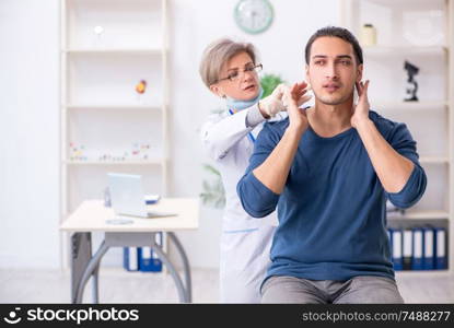 The young patient visiting doctor in hospital. Young patient visiting doctor in hospital