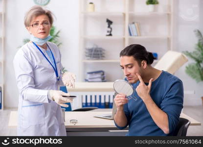 The young patient visiting doctor in hospital. Young patient visiting doctor in hospital