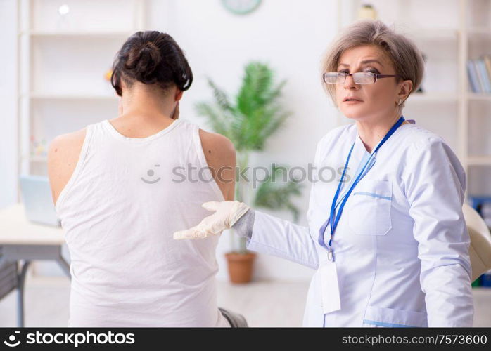 The young patient visiting doctor in hospital. Young patient visiting doctor in hospital
