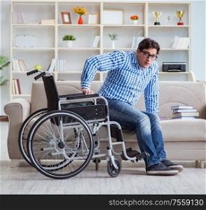 The young student on wheelchair in disability concept. Young student on wheelchair in disability concept