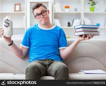 The young student preparing for exams studying at home on a sofa. Young student preparing for exams studying at home on a sofa