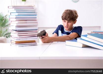 The young student stressed due to excessive studies. Young student stressed due to excessive studies