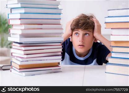 The young student stressed due to excessive studies. Young student stressed due to excessive studies