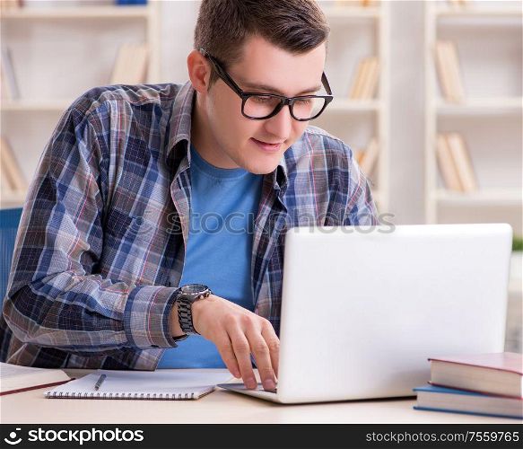 The young student studying over internet in telelearning concept. Young student studying over internet in telelearning concept