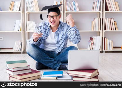 The young student studying with books. Young student studying with books