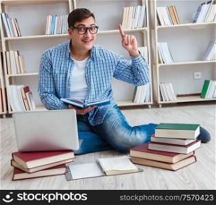 The young student studying with books. Young student studying with books