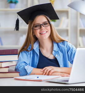 The young teenage female student preparing for exams at home. Young teenage female student preparing for exams at home