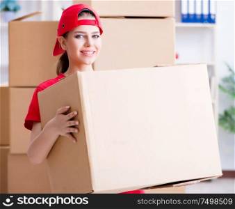 The young woman delivering boxes of personal effects. Young woman delivering boxes of personal effects