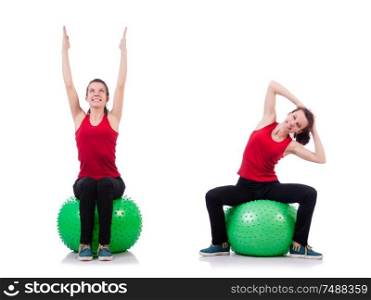 The young woman exercising with swiss ball. Young woman exercising with swiss ball