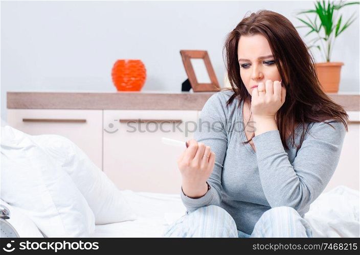 The young woman finding out about her pregnancy. Young woman finding out about her pregnancy