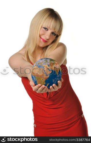 The young woman holds the globe in hands. It is isolated on a white background