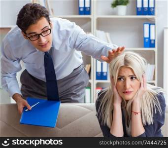 The young woman visiting psychiatrist man doctor for consultation. Young woman visiting psychiatrist man doctor for consultation