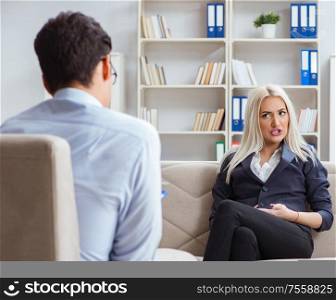 The young woman visiting psychiatrist man doctor for consultation. Young woman visiting psychiatrist man doctor for consultation