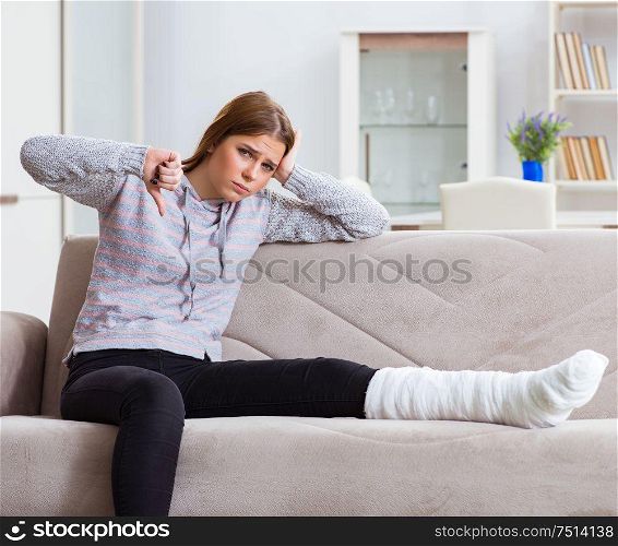 The young woman with broken leg at home. Young woman with broken leg at home