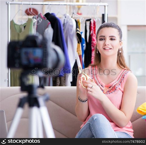 The young woman working as fashion blogger vlogger. Young woman working as fashion blogger vlogger