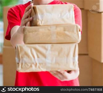 The young woman working in parcel distribution center. Young woman working in parcel distribution center