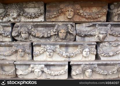 Theatre masks on the wall in Aphrodisias