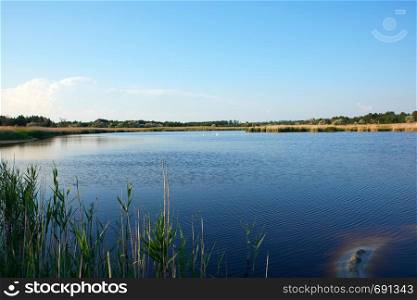 therapeutic lake with iodine and minerals in the middle of the wild steppe, Lake Blue Ukraine, city of Kherson