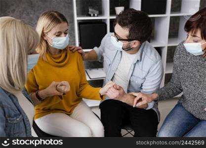 therapy community with surgical mask