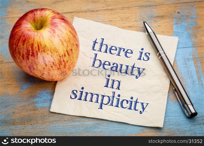 There is beauty in simplicity - handwriting on a napkin with a fresh apple
