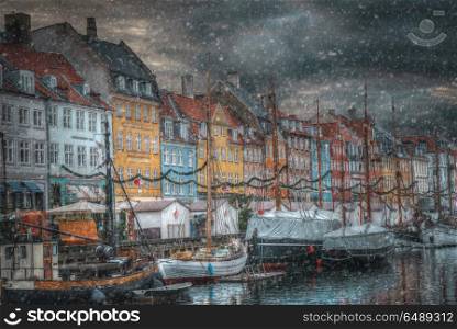 there is snow in the winter. Nyhavn is the old harbor of Copenhagen. Denmark. Nyhavn is the old harbor of Copenhagen