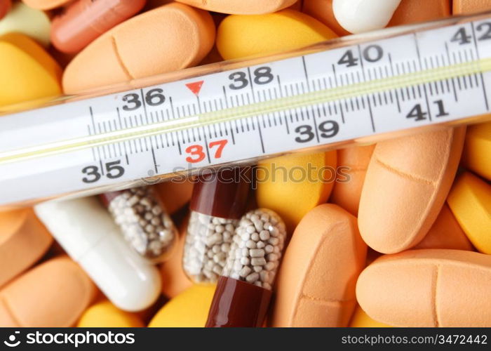 thermometer and drugs medical background