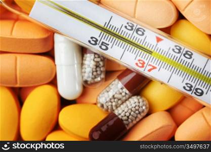 thermometer and drugs medical background