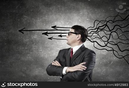 These thoughts in my head. Thoughtful adult businessman with arrows and thoughts coming out of his head