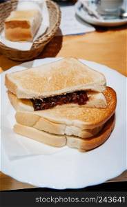 Thick slices of Ogura toast - red bean paste toast with butter, local breakfast of Nagoya - Japan