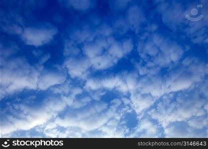 Thick White Clouds In A Blue Sky