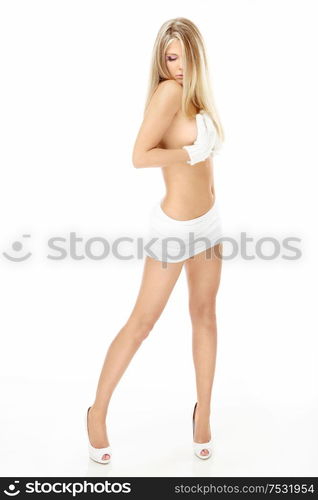 Thin beautiful blonde to the utmost, isolated on a white background