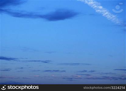 Thin Clouds In A Soft Blue Sky