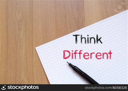 Think different text concept write on notebook